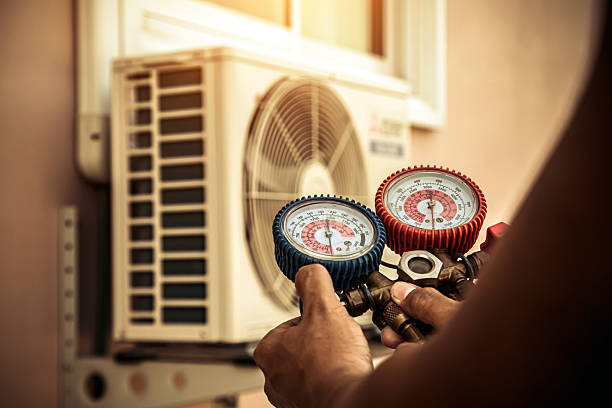 Professional Air Conditioning Service technician working in Brooks, KY
